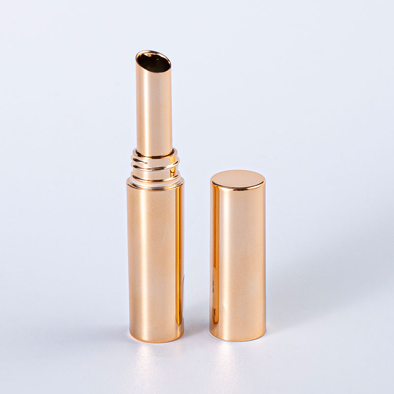 Tubo de lápiz labial de lujo en oro rosa – estuche cilíndrico metálico