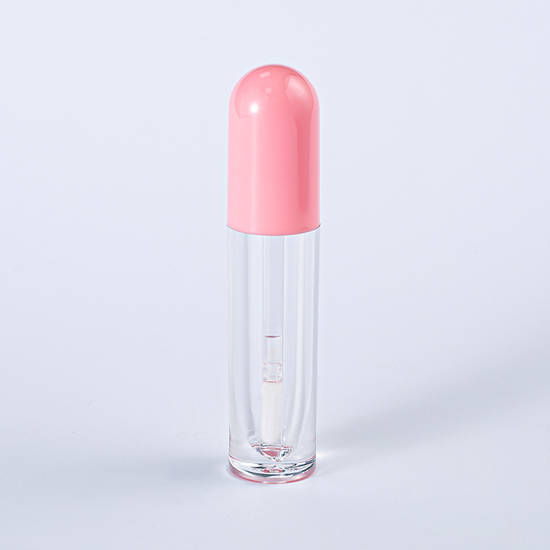 Tubo de brillo labial con gotero rosa