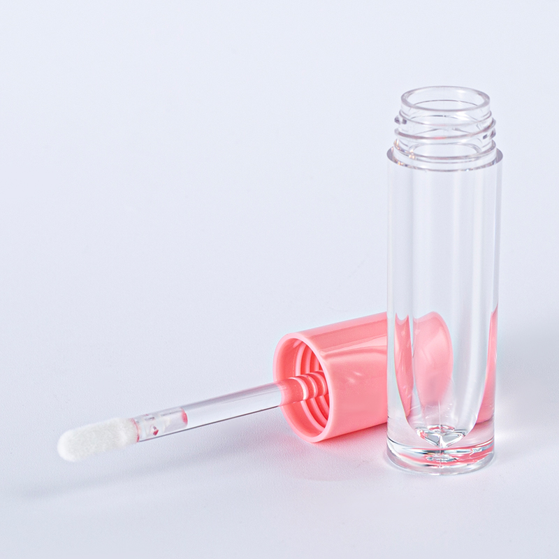Tubo de brillo labial con gotero rosa