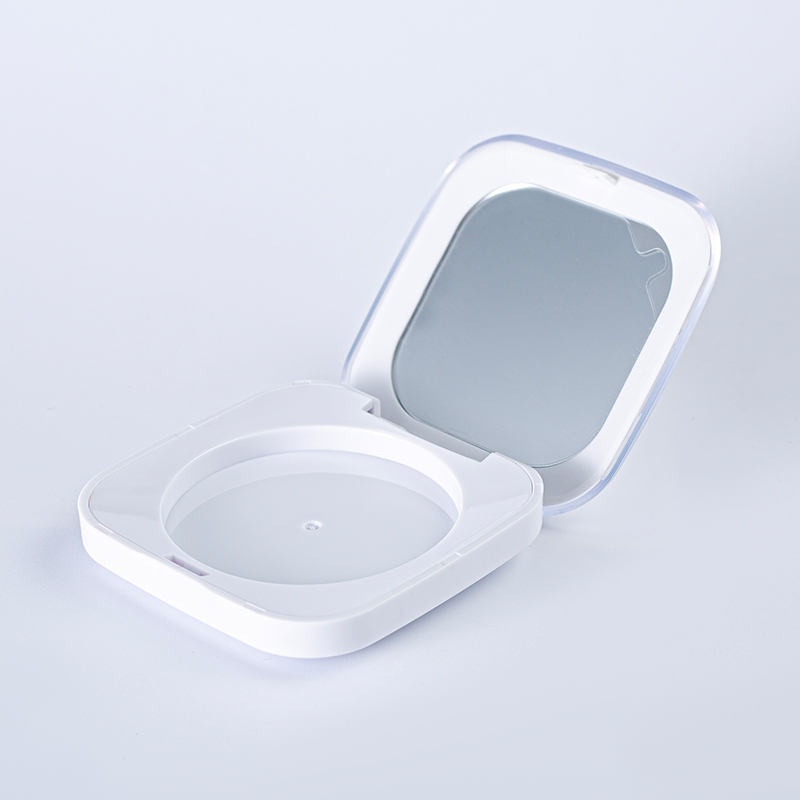 Polvo compacto con tapa transparente cuadrada redondeada
